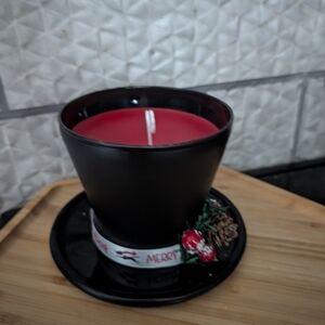 Festive Black and Red Candle with Holiday Decor